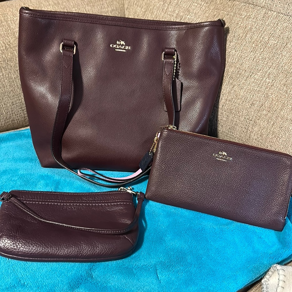 coach “oxblood” colored purse and wallets set